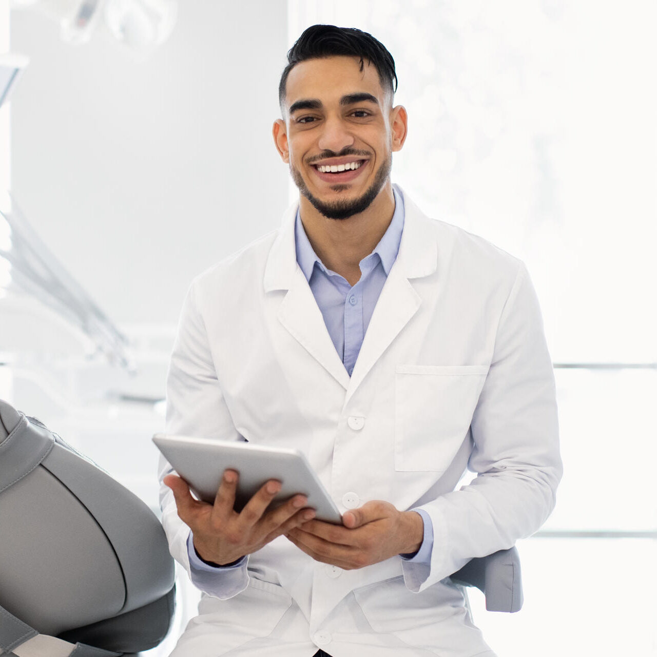 modern-dentistry-portrait-of-young-arab-stomatolo-2025-03-18-19-00-59-utc-e1753428291742.jpg